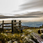 *Oak stile on Moel Famau with Vale of Clwyd in distance