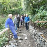 Volunteers restoring a dry stone wall