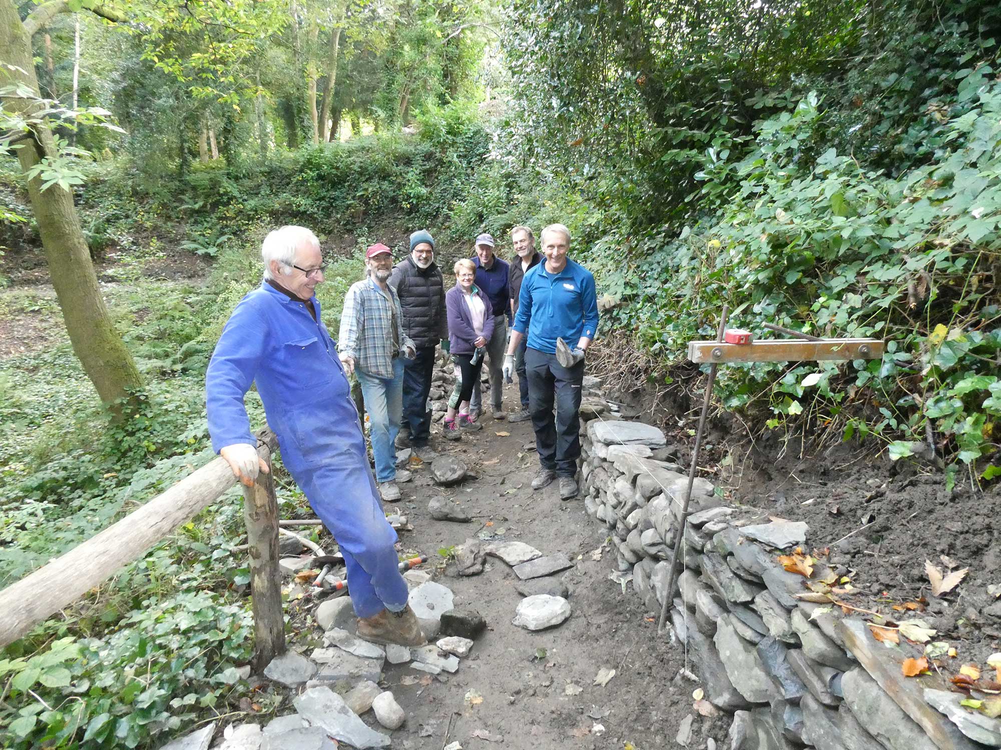 Volunteers restoring a dry stone wall