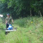 *AONB Ranger-mowing a wildflower meadow